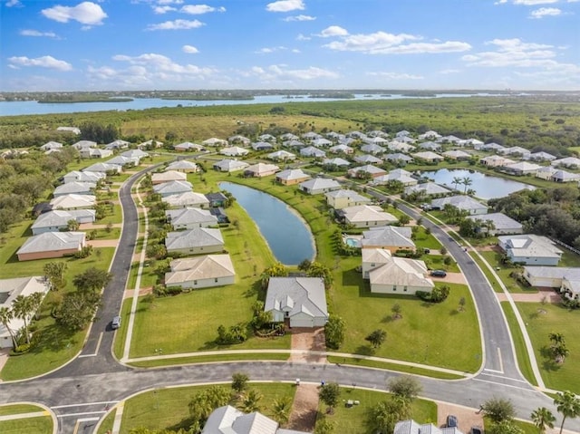 drone / aerial view featuring a water view