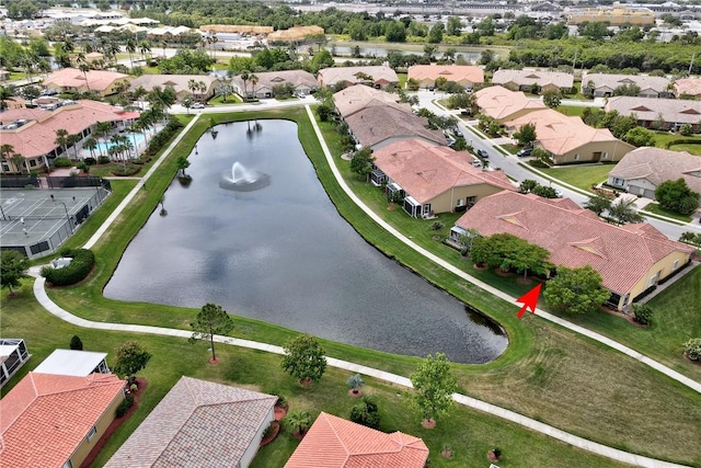 aerial view featuring a water view and a residential view