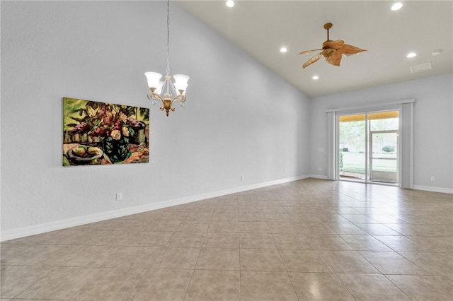 empty room featuring recessed lighting, high vaulted ceiling, visible vents, and ceiling fan with notable chandelier