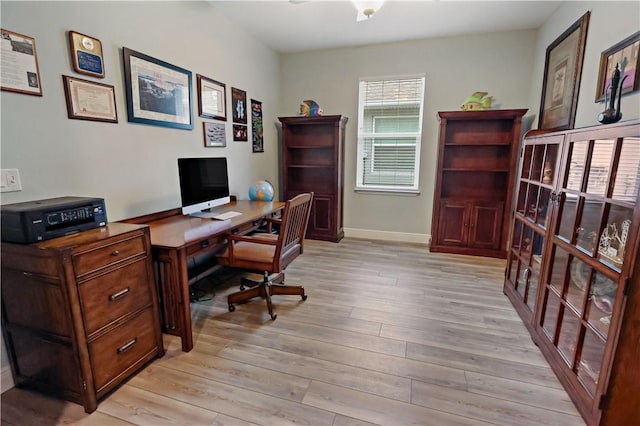 home office featuring light hardwood / wood-style flooring