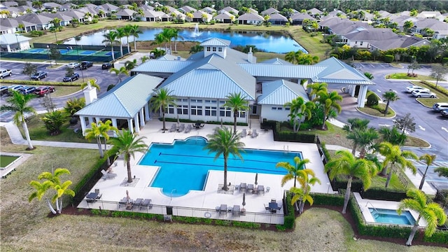 drone / aerial view with a water view