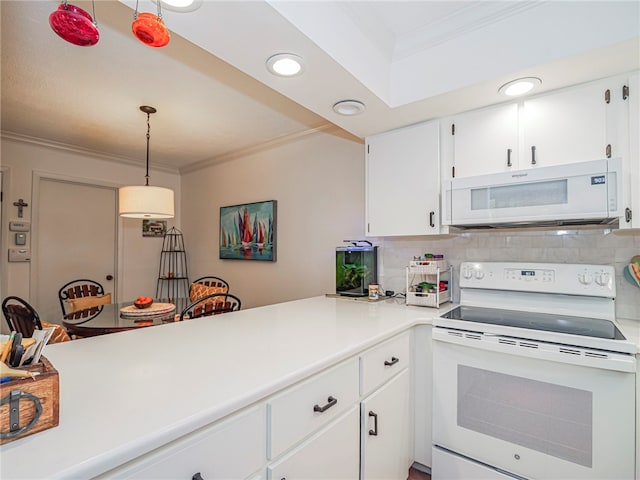 kitchen featuring decorative backsplash, white cabinetry, decorative light fixtures, and white appliances