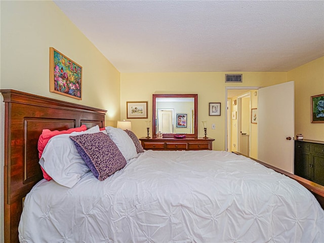 bedroom with a textured ceiling