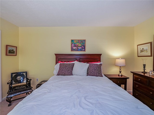 bedroom featuring carpet