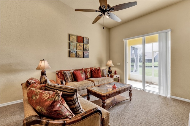 living room with carpet flooring, ceiling fan, and vaulted ceiling