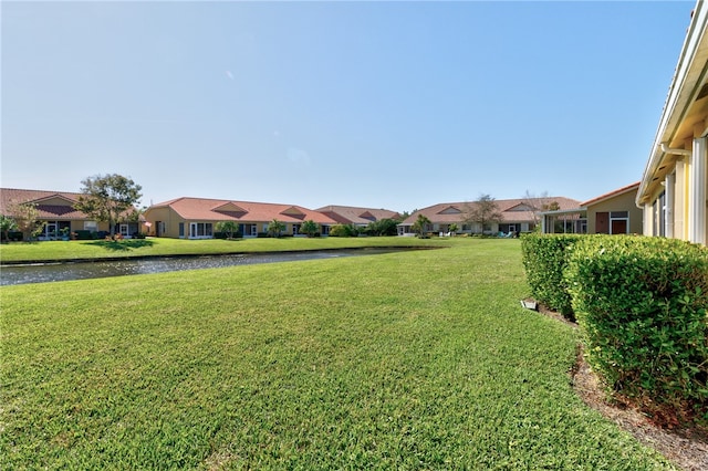 view of yard with a water view