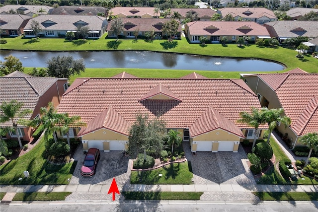 drone / aerial view featuring a water view