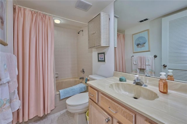 full bathroom featuring vanity, shower / bath combo, tile patterned floors, and toilet