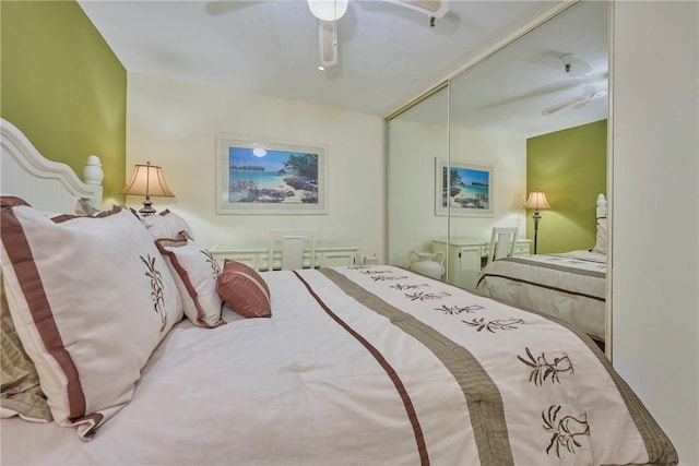 bedroom featuring ceiling fan and a closet