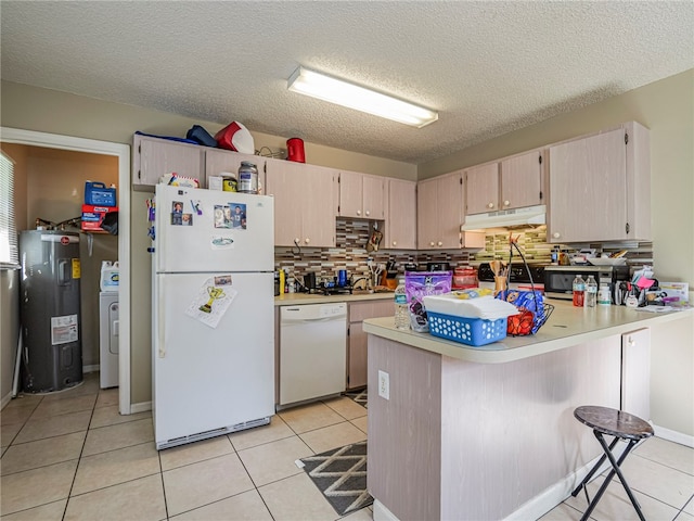 kitchen featuring kitchen peninsula, a textured ceiling, white appliances, and electric water heater