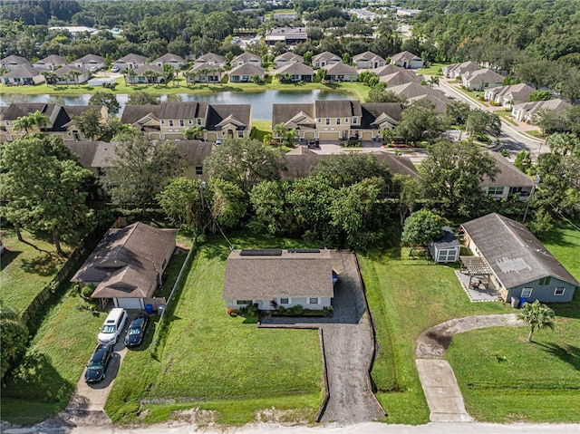 bird's eye view with a water view