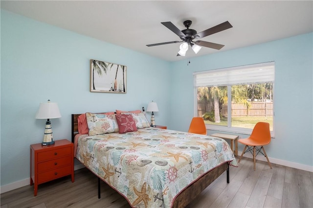 1203 Linmoor Cir NE, Palm Bay, FL 32907 - bedroom featuring wood finished floors, baseboards, and ceiling fan