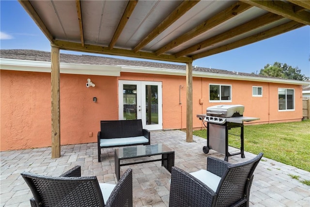 1203 Linmoor Cir NE, Palm Bay, FL 32907 - view of patio / terrace featuring french doors and area for grilling