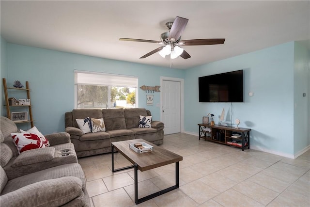 1203 Linmoor Cir NE, Palm Bay, FL 32907 - living room with ceiling fan, light tile patterned floors, and baseboards
