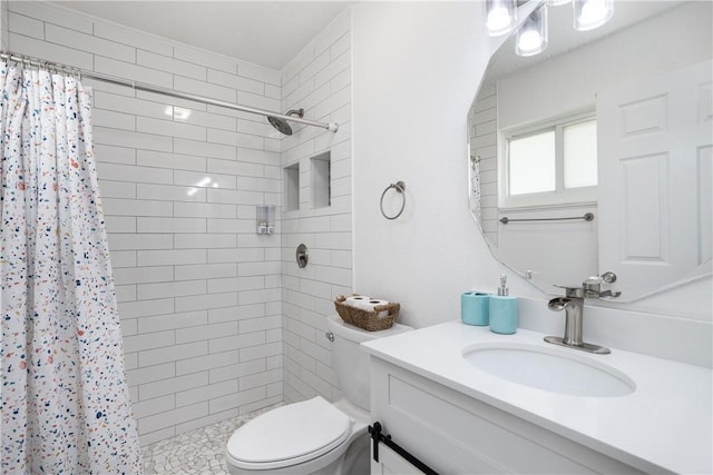 1203 Linmoor Cir NE, Palm Bay, FL 32907 - bathroom with toilet, tiled shower, and vanity