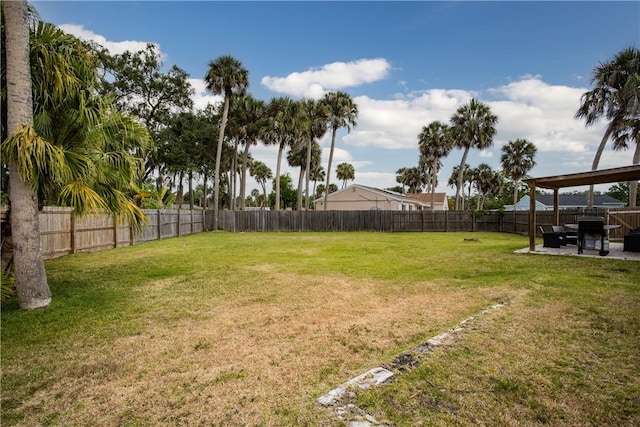 1203 Linmoor Cir NE, Palm Bay, FL 32907 - view of yard with a patio