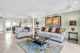 living room featuring decorative columns