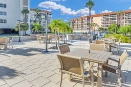 surrounding community featuring a patio