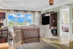 living room featuring crown molding