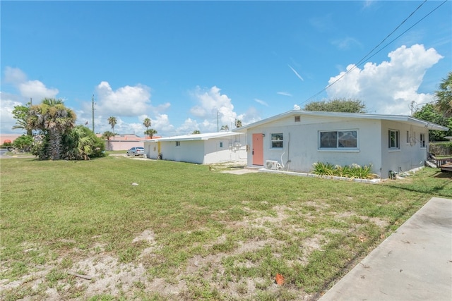 view of front of home with a front yard