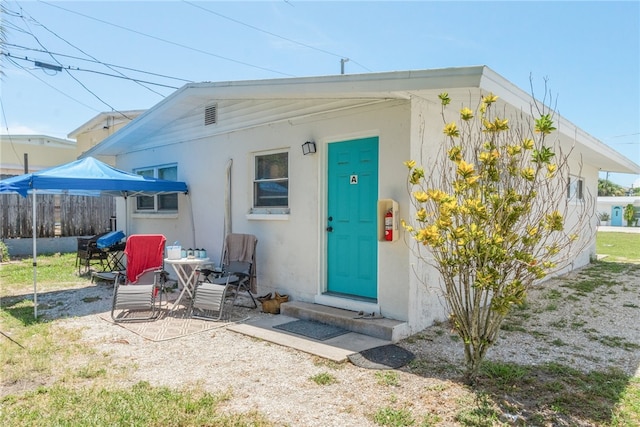 rear view of property with a patio