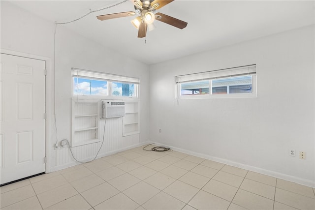 673 S Orlando Ave, Cocoa Beach, FL 32931 - unfurnished room with baseboards, cooling unit, ceiling fan, and built in shelves