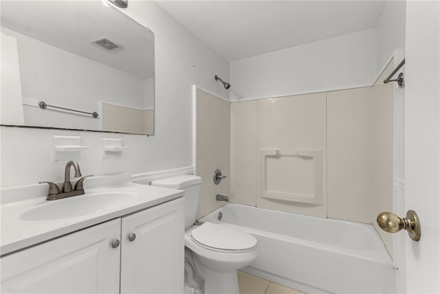 673 S Orlando Ave, Cocoa Beach, FL 32931 - full bathroom featuring toilet, tile patterned floors, vanity, and bathing tub / shower combination