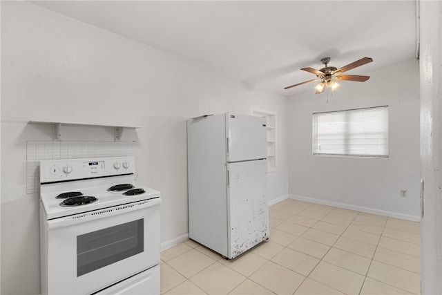 673 S Orlando Ave, Cocoa Beach, FL 32931 - kitchen featuring white appliances, a ceiling fan, light tile patterned flooring, and baseboards