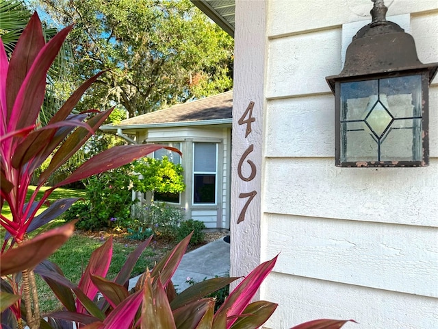 exterior details featuring ceiling fan