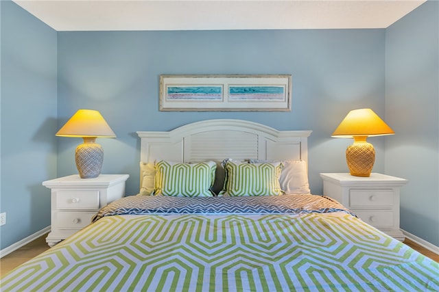 bedroom featuring hardwood / wood-style flooring