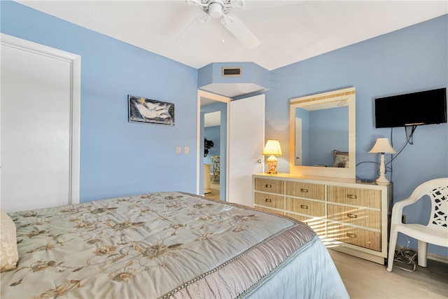 bedroom with ceiling fan and light wood-type flooring