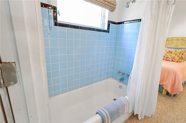 bathroom with shower / bath combination with curtain