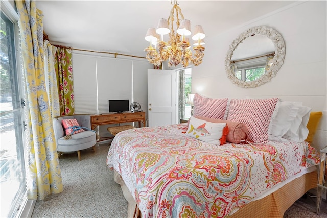 bedroom with a chandelier