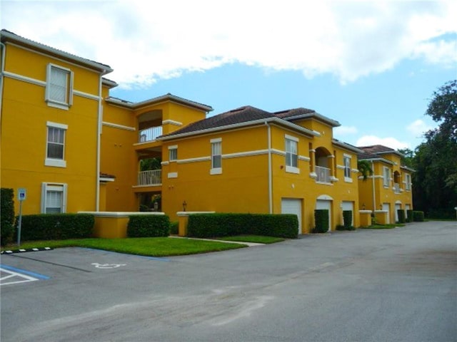view of building exterior featuring an attached garage