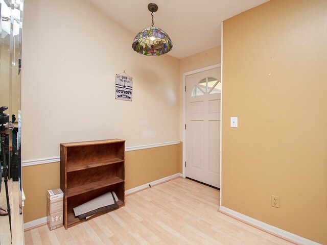 entryway with light hardwood / wood-style floors