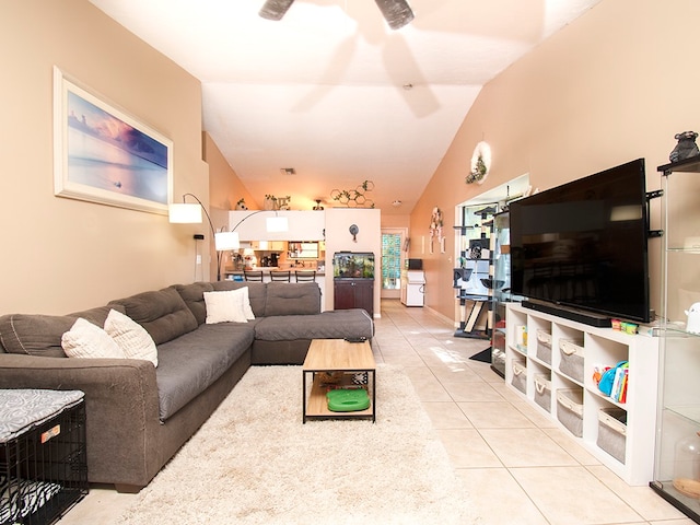 tiled living room featuring lofted ceiling