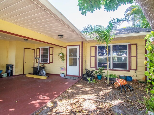 doorway to property with a patio