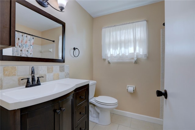 bathroom with tasteful backsplash, tile patterned floors, a shower with curtain, vanity, and toilet