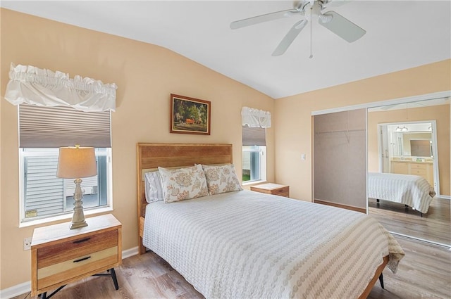 1218 Chipewa Dr, Sebastian, FL 32976 - bedroom featuring vaulted ceiling, a closet, wood finished floors, baseboards, and ceiling fan