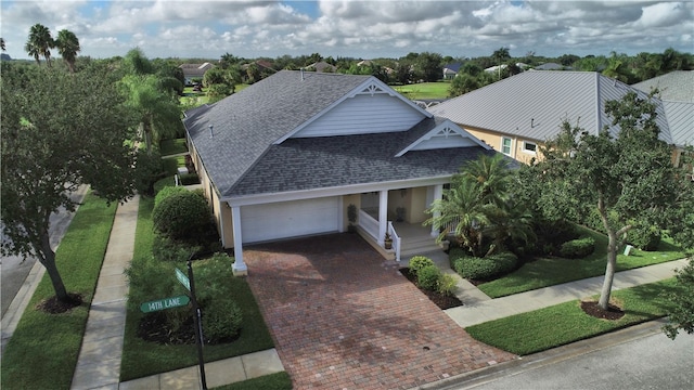 view of front facade featuring a garage and a porch