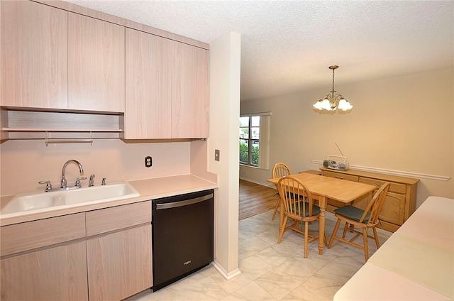 kitchen featuring decorative light fixtures, light brown cabinets, sink, dishwasher, and a chandelier