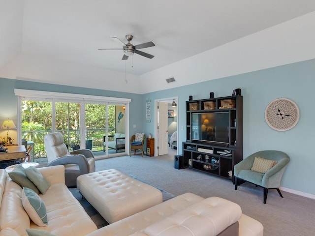 133 E Park Shores Cir Unit 8E, Vero Beach, FL 32963 - living area with carpet floors, ceiling fan, lofted ceiling, and baseboards
