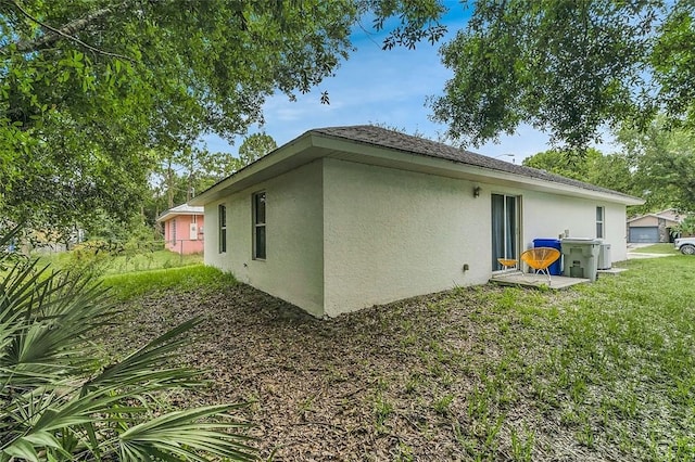 1360 18th Ave SW, Vero Beach, FL 32962 - view of side of property with stucco siding