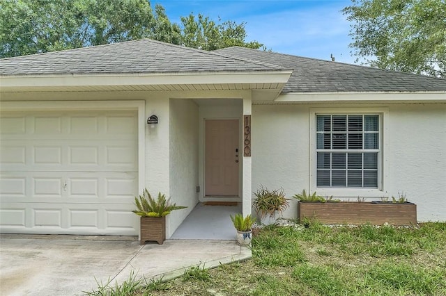 1360 18th Ave SW, Vero Beach, FL 32962 - entrance to property with roof with shingles, a garage, and stucco siding