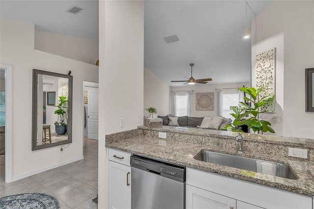 1360 18th Ave SW, Vero Beach, FL 32962 - kitchen featuring stainless steel dishwasher, a sink, ceiling fan, white cabinetry, and light stone counters