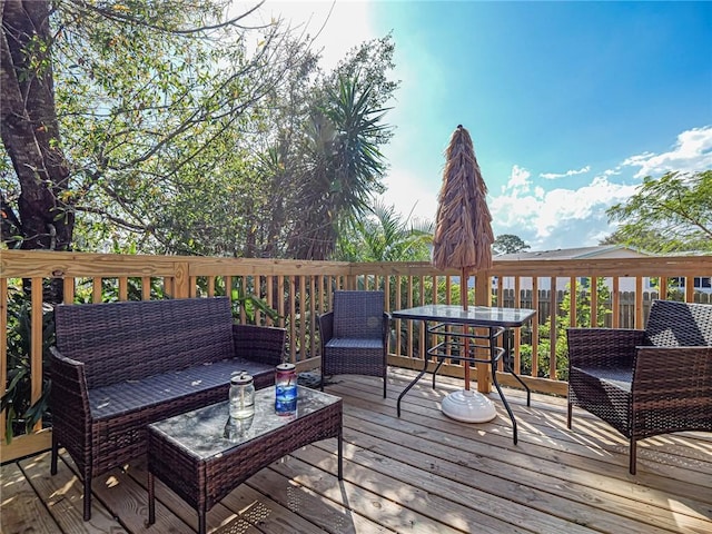 deck with an outdoor hangout area