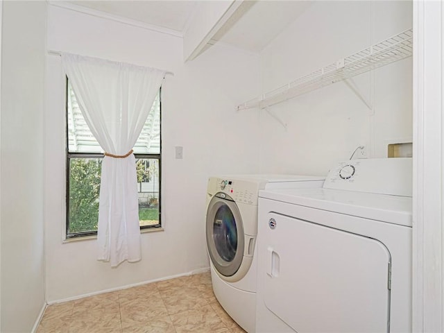 washroom featuring washer and dryer