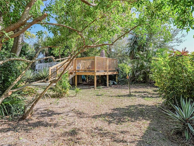 view of yard with a deck