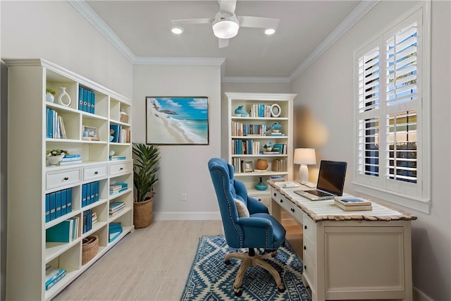 home office with light wood-style flooring, a ceiling fan, baseboards, and ornamental molding