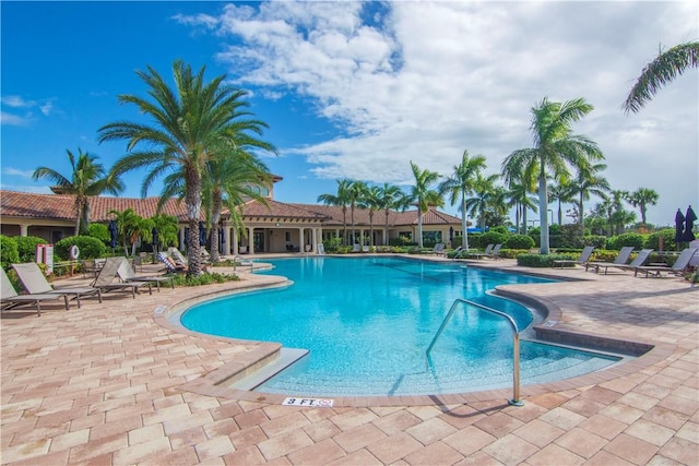 community pool featuring a patio area